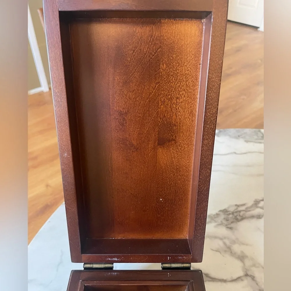 Wooden box for displaying coins with the name marked Danze logo
